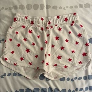 Cat and Jack girl’s white sweat shorts with red stars.
